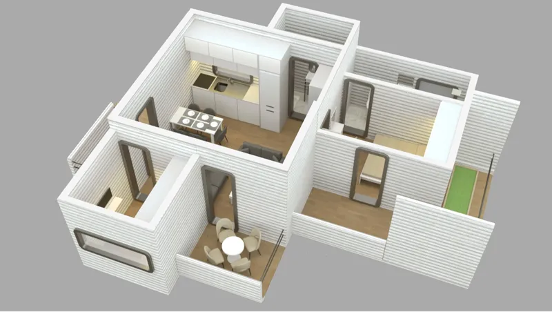 Interior view of ABADGAR’s modular housing unit showing compact living, kitchen, sleeping, and service spaces.