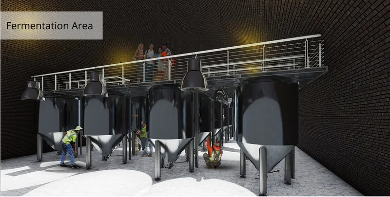 Large fermentation tanks sit beneath an observation walkway, allowing visitors to experience the winemaking process from above.