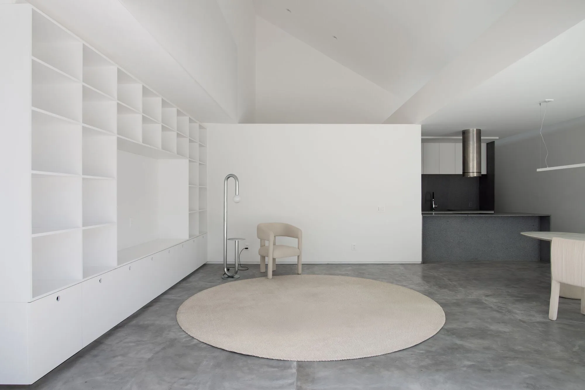 BLOCO Arquitetos Carves Three Cuts into a Narrow Brasília Row House to Shape Light and Volume
