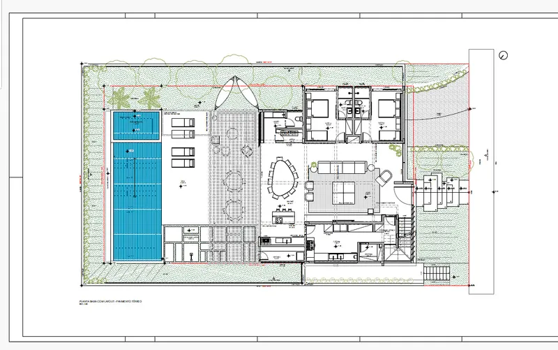 Floor plan drawing showing a residence with a long swimming pool and central courtyard with circular skylights