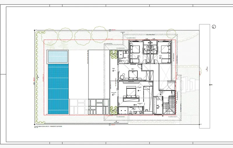 Floor plan drawing depicting a multi-level residence with a lap pool and double-height living spaces