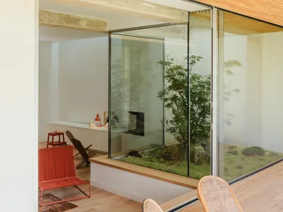 delavegacanolasso Builds Three Terraced Houses in Madrid That Turn Inward to Find Light