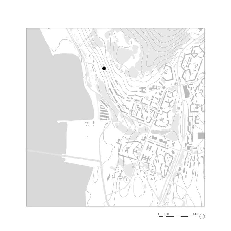 Site plan drawing showing the tower location marked with black dot amid topographic contours and settlement