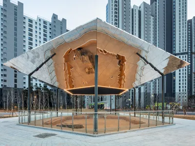 YZA Floats a Reflective Canopy Over Ancient Baekje Ruins in Seoul