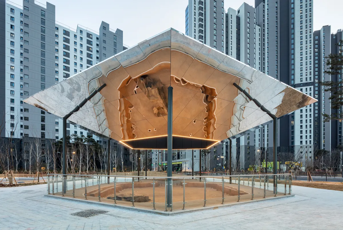 YZA Floats a Reflective Canopy Over Ancient Baekje Ruins in Seoul