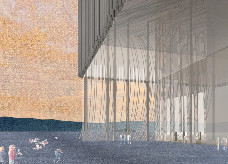 The transparent entrance creates a sheltered public threshold while maintaining a strong visual connection to the surrounding sea