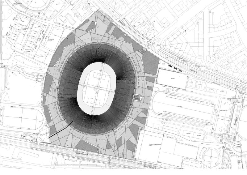 Site plan drawing showing an oval stadium bowl surrounded by urban streets and adjacent buildings