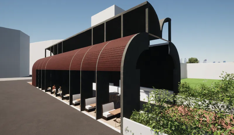 Vaulted brick volume defines Dark Brewed’s exterior, blending historic cafe language with contemporary urban form.