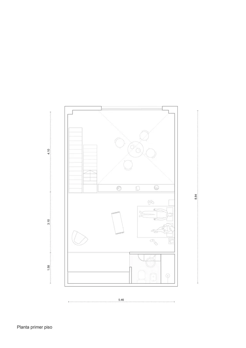 First floor plan drawing showing staircase, seating area, bedroom and bathroom spaces