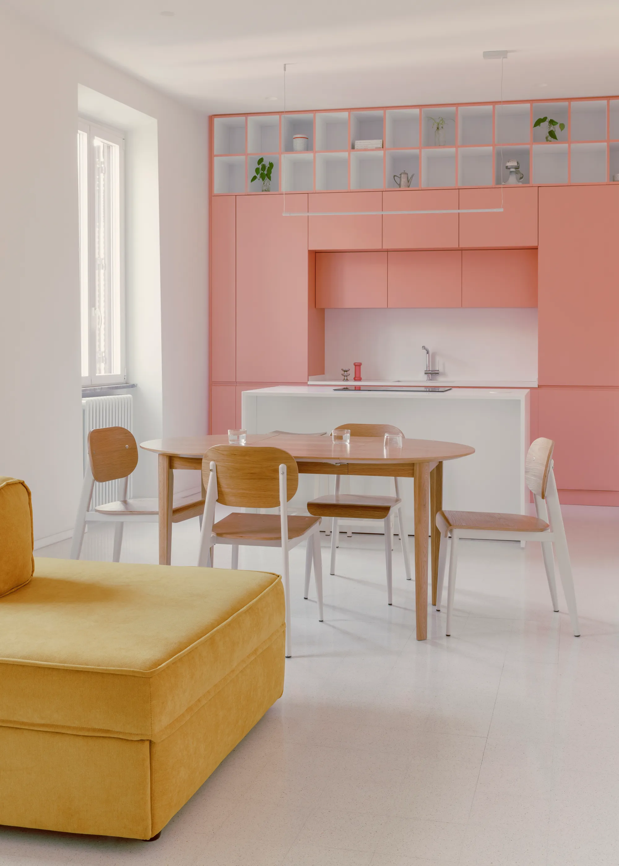 Margine Replaces Walls with Color to Reorganize a Pre-War Roman Apartment