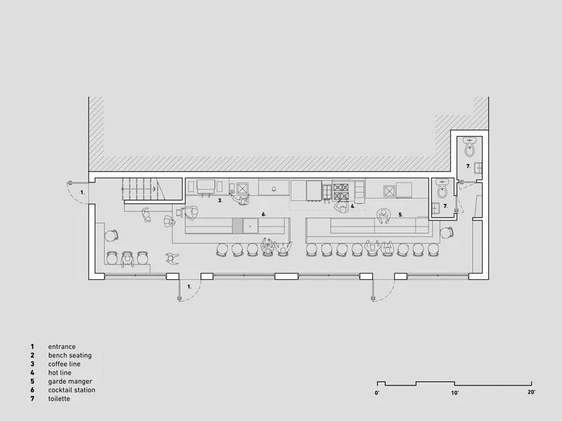 Floor plan drawing showing a linear bar layout with seating areas, service counters and restrooms
