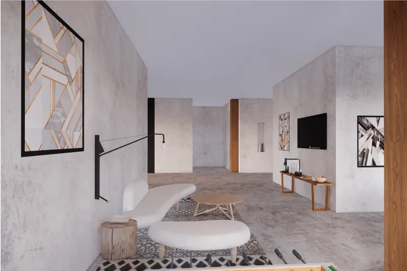 Soft furnishings and minimal partitions create a relaxed semi-private living environment.