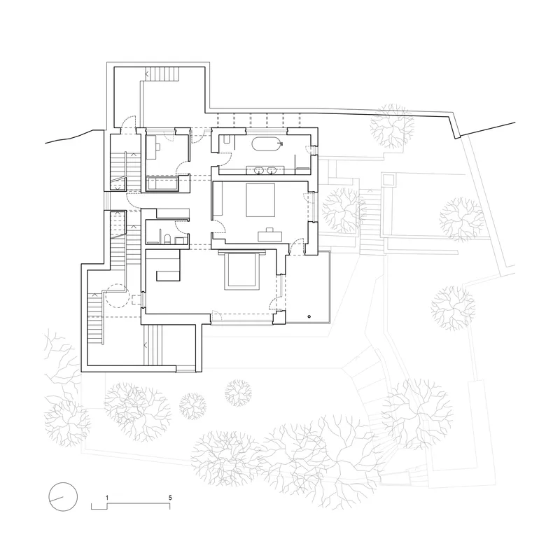 Upper floor plan drawing illustrating living spaces bathroom and exterior terraces with trees below