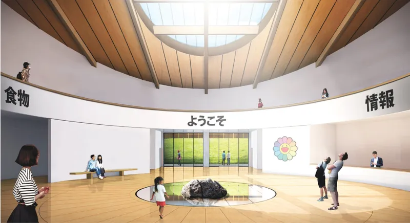 Circular entrance hall with skylight, central stone feature, reception, food area, and public gathering space.