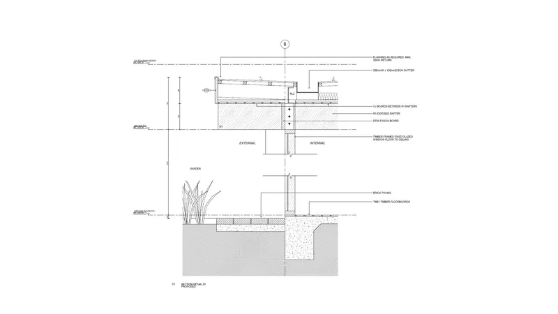 Construction section detail drawing showing wall assembly, foundation, and planted bed with vegetation