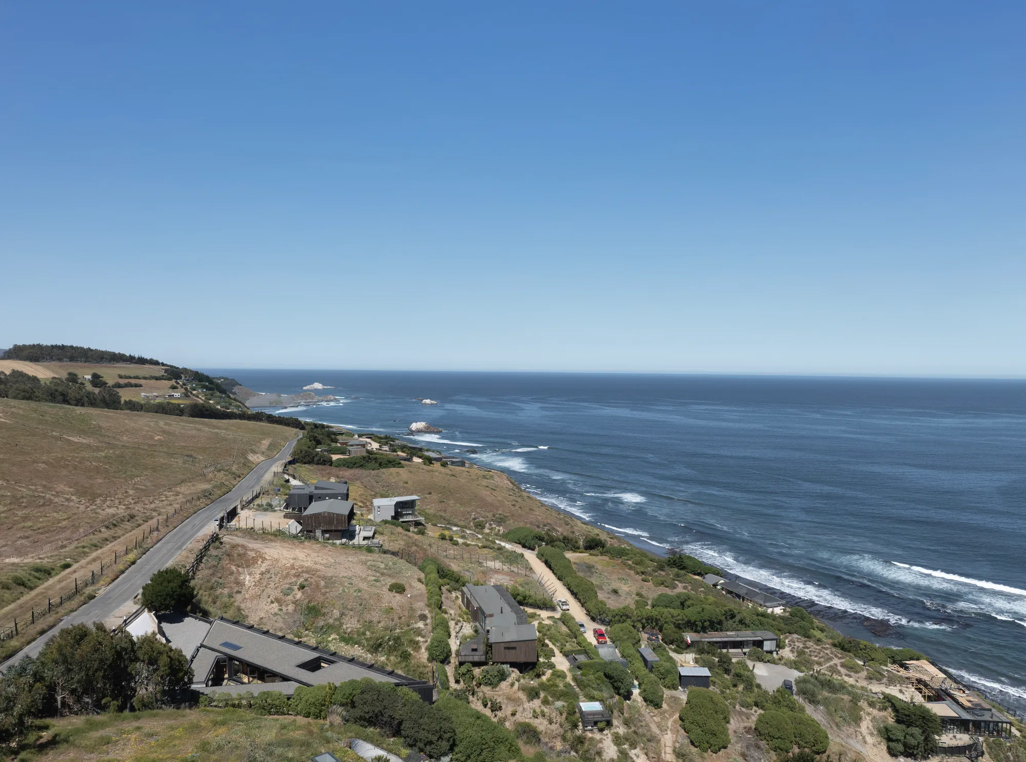 Gonzalo Rufin and Manuel Rufin Carve a Triangular House into a Chilean Coastal Ravine