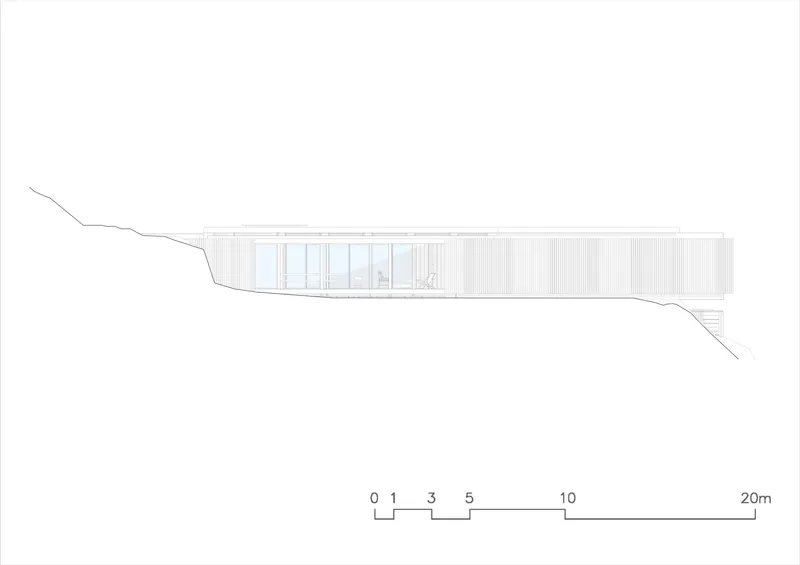 Elevation drawing showing the horizontal volume bridging across sloped terrain with vertical cladding