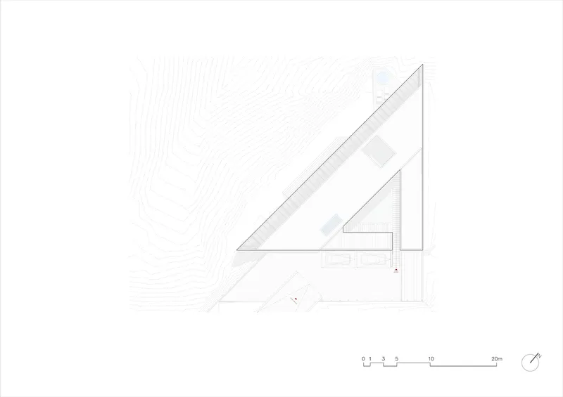 Site plan drawing with topographic contours depicting the angular residence nestled into the landscape