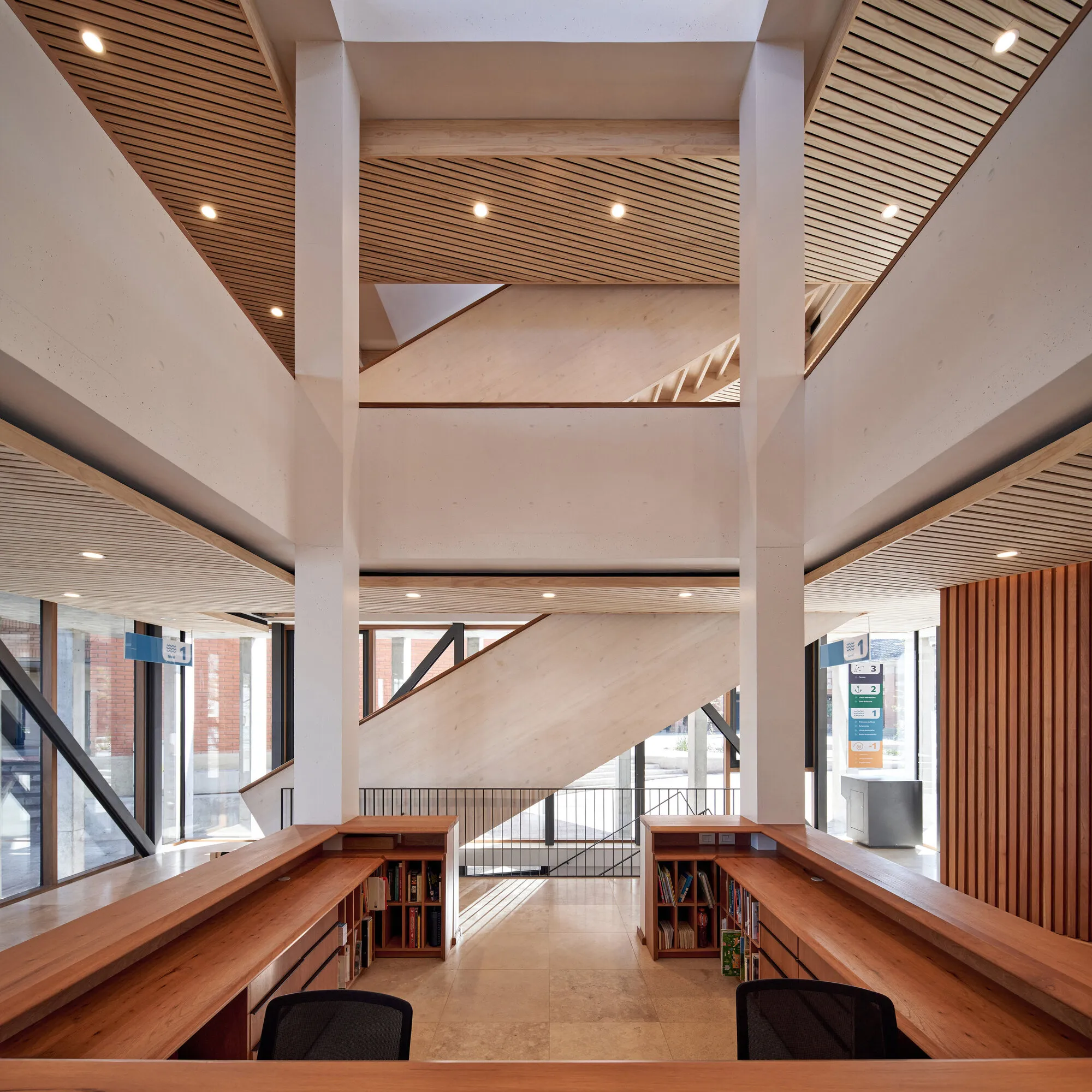 José Ignacio Valdivieso Wraps a School Library in Brick Fins and Timber Light in Santiago