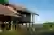 Yangnar Studio Raises a Timber Farmhouse on Stilts Above the Rice Fields of Chiang Mai