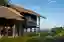 Yangnar Studio Raises a Timber Farmhouse on Stilts Above the Rice Fields of Chiang Mai