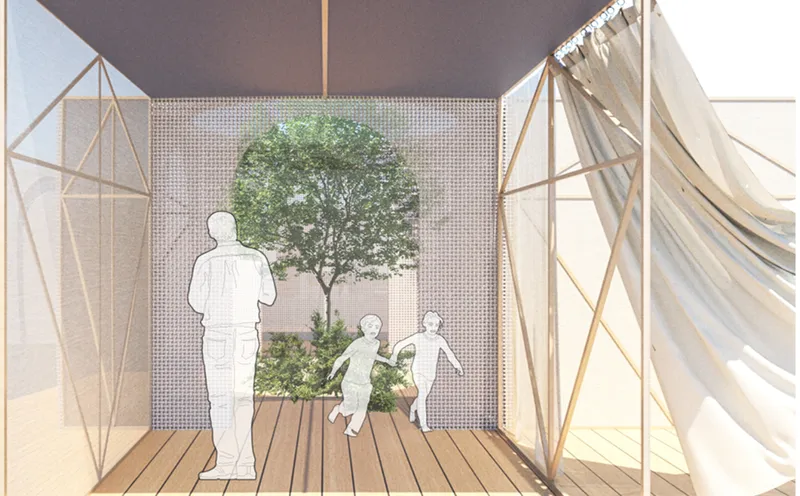 A central courtyard with a tree creates light, ventilation, and emotional calm inside the shelter