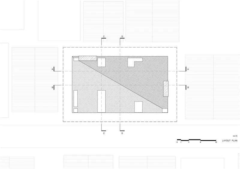 Layout plan drawing showing a diagonal line crossing a rectangular footprint with openings
