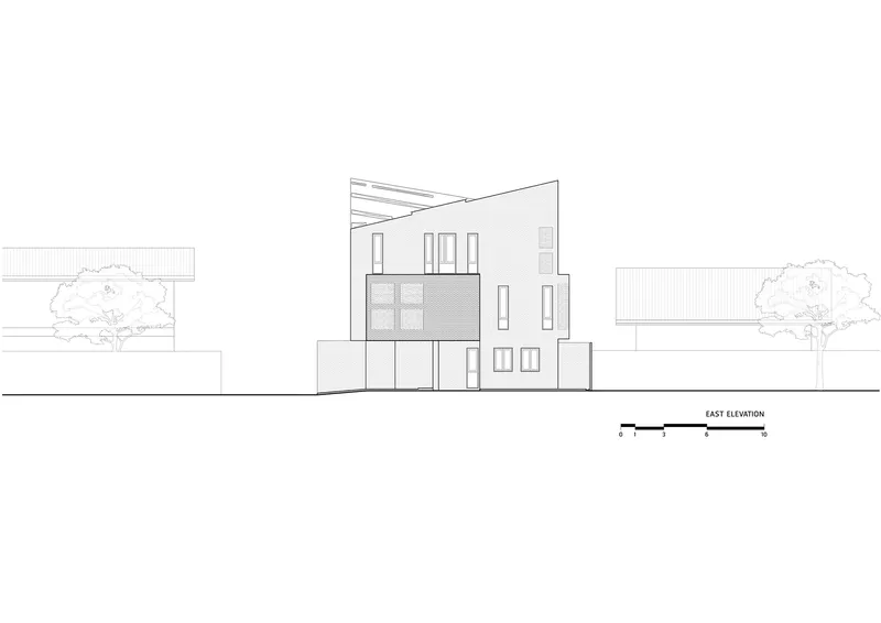 East elevation drawing showing a two-story volume with angled roofline and flanking trees