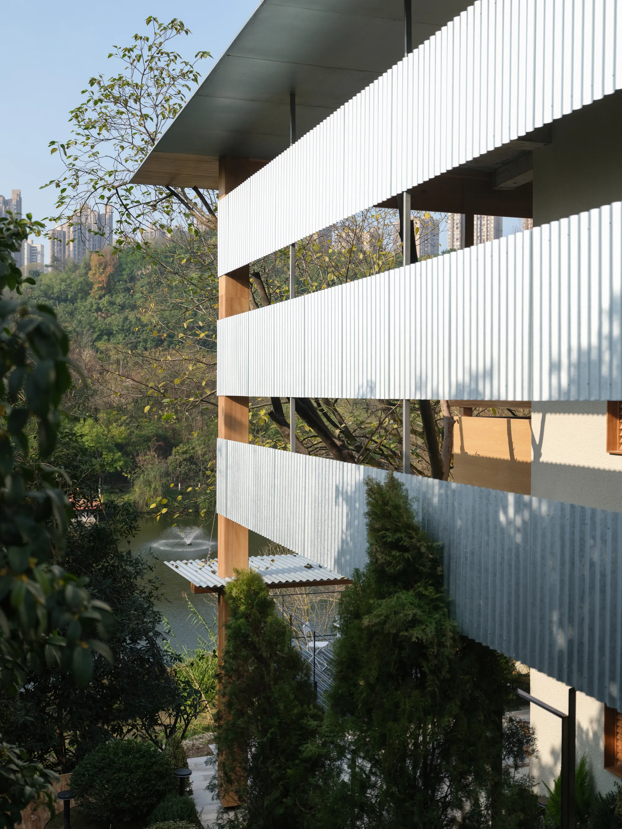 Vari Architects Wraps a Lakeside Pavilion in Timber and Corrugated Metal for an Italian Restaurant in Chongqing