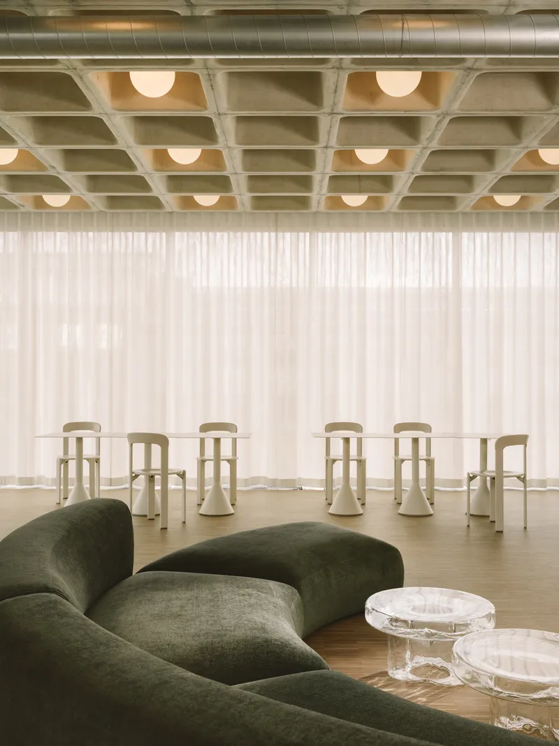 RHO Wraps a Berlin Social Media Agency in Concrete Waffle Ceilings and Sheer Light