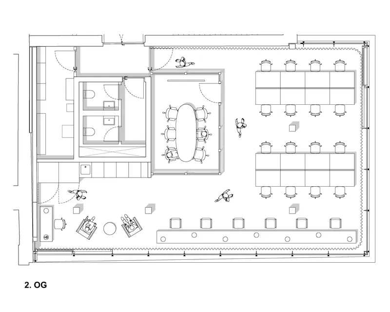 Second floor plan featuring workstations along the perimeter and central communal dining tables