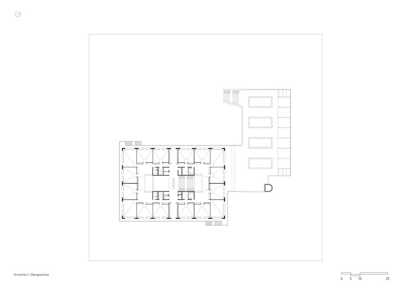 Floor plan drawing showing a rectangular building with central circulation core and adjacent linear wing