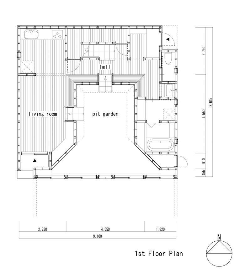 First floor plan showing rooms arranged around a central pit garden with hatched wood decking