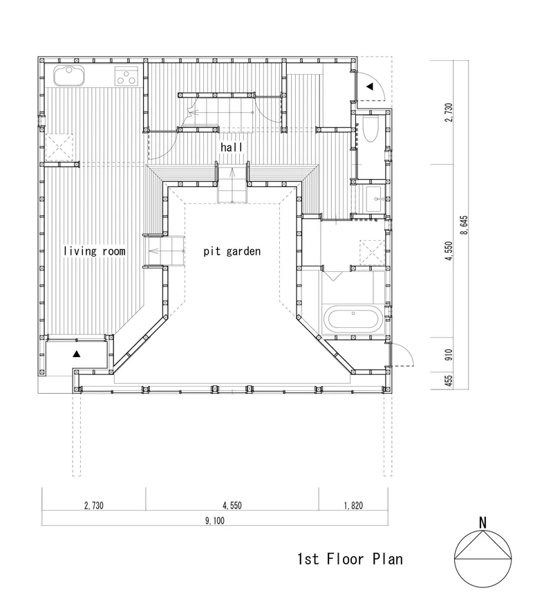 First floor plan showing rooms arranged around a central pit garden with hatched wood decking