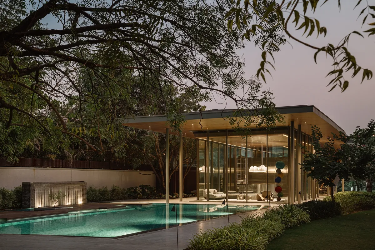 andblack design studio Folds a Concrete Roof Down to the Ground in an Ahmedabad Poolside Pavilion