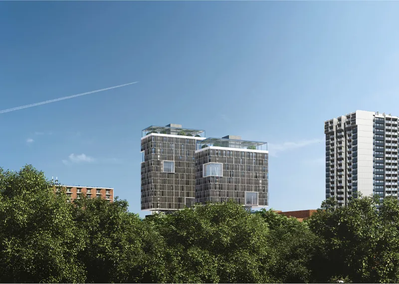 Sherbourne Commons rises above Moss Park, connecting social housing architecture with Toronto’s green urban fabric.