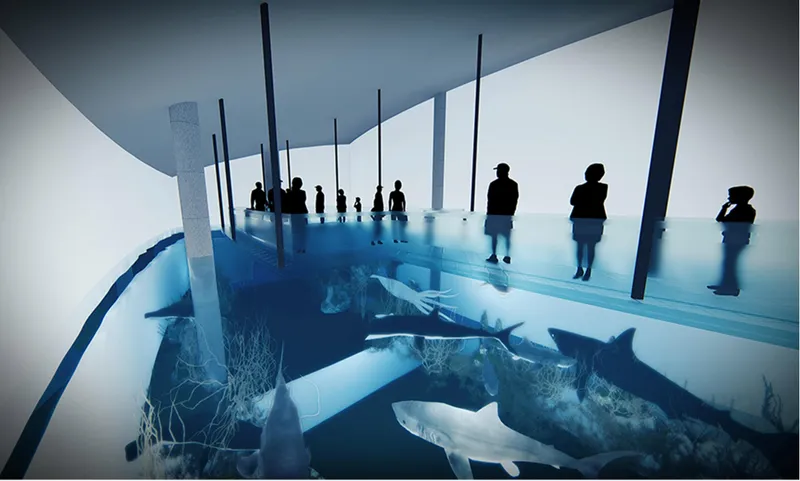 Immersive underwater tunnel where visitors experience aquatic life through a transparent river and ocean exhibition path.