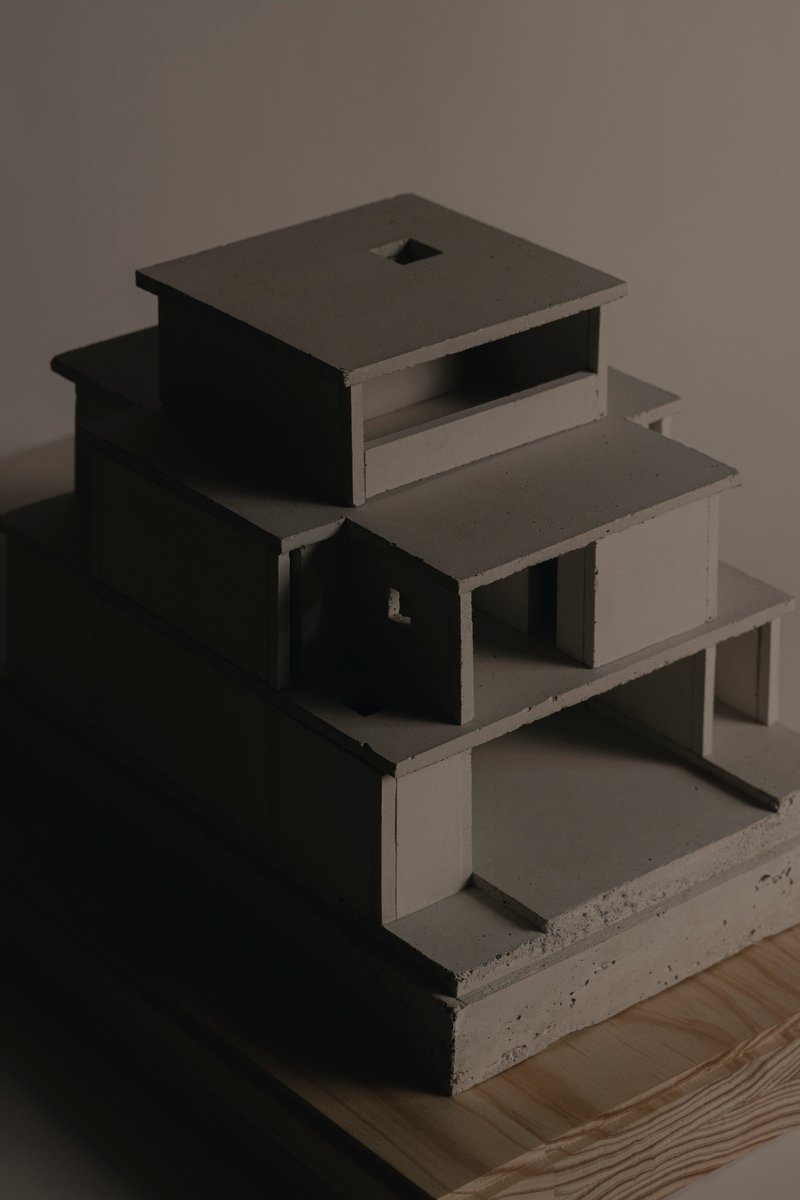 Shadow study of the physical model highlighting recessed voids and projecting roof planes