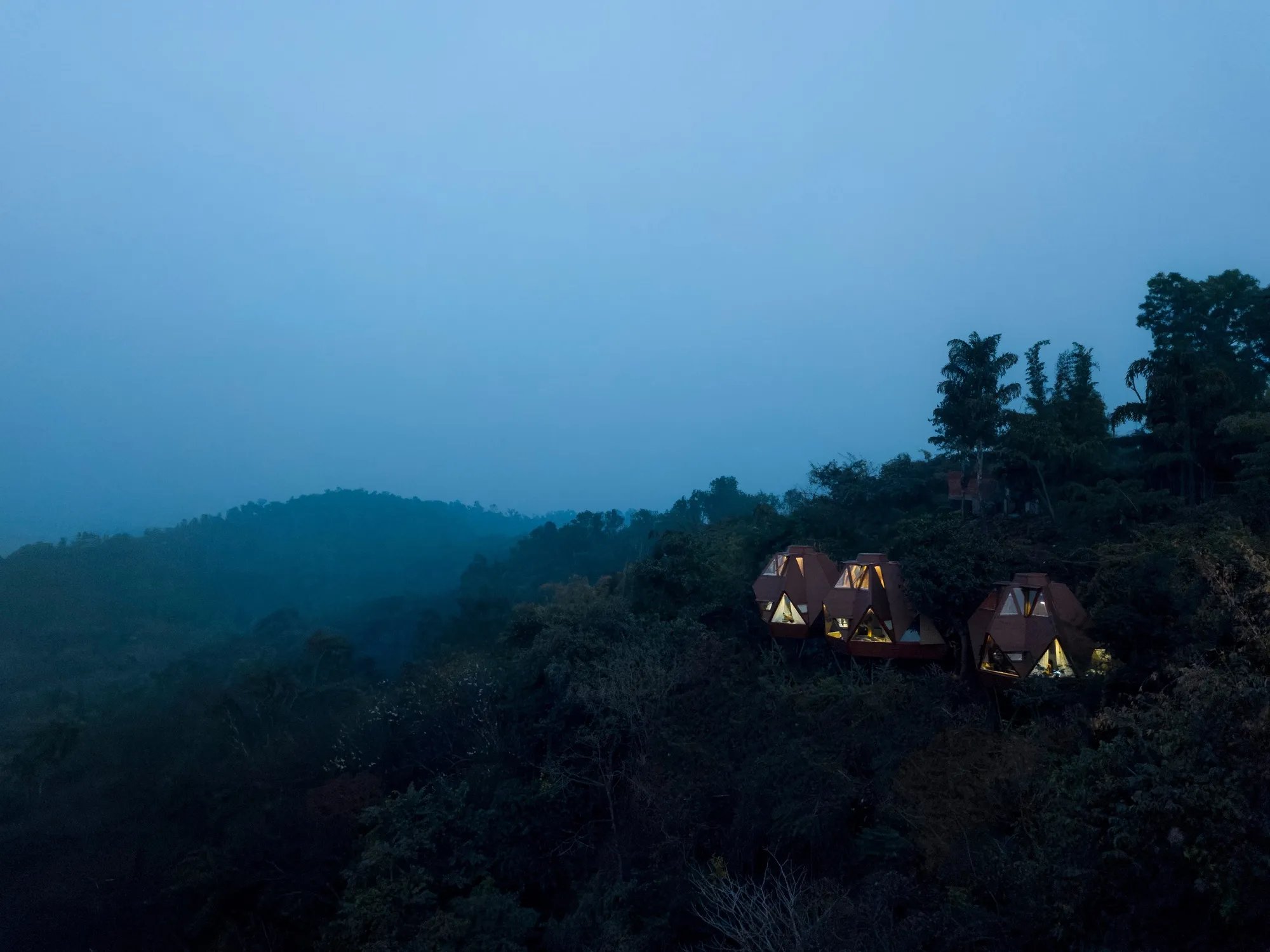 PMA madhushala Nests Truncated Tetrahedrons into a 30-Degree Hillside Overlooking Panshet Lake