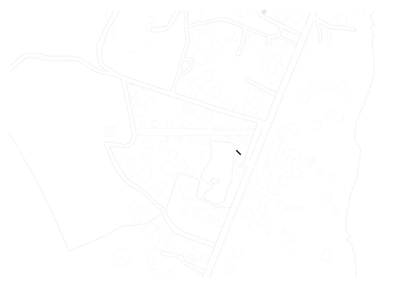 Site plan drawing showing the linear structure positioned within surrounding topography and pathways