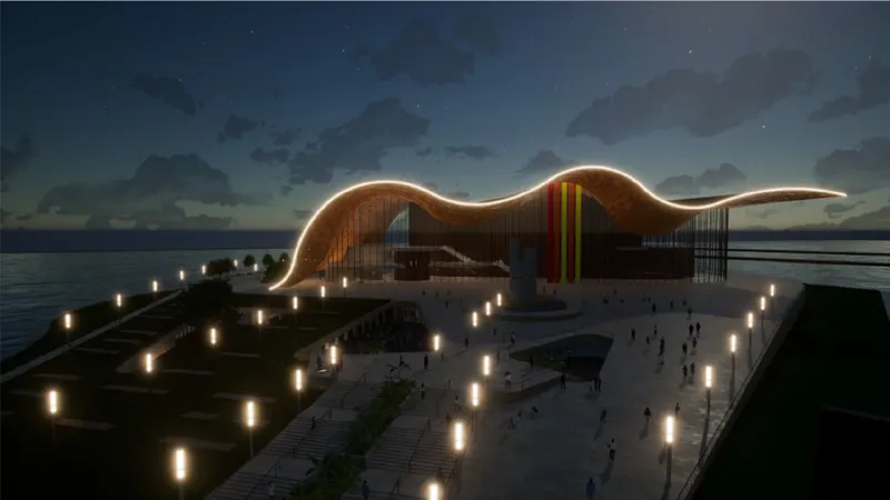 The wave-shaped opera house glows across Tallinn’s waterfront, creating a dramatic cultural landmark at night.