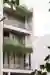 Neogenesis and Studi0261 Stack Balconies and Green Veils into a Layered Urban Home in Surat