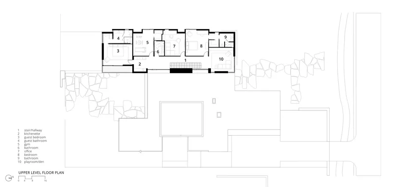 Upper level floor plan showing bedroom wing, central stairwell and balcony overlooking the courtyard