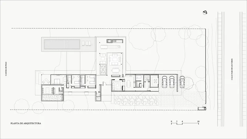 Floor plan drawing showing linear arrangement of rooms with central courtyard and exterior terraces