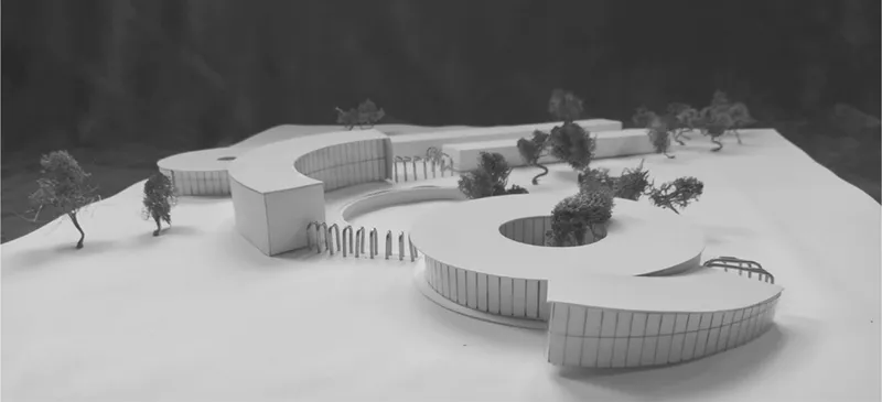Physical model of the three interconnected lobed volumes with circular courtyards and vertical glazing