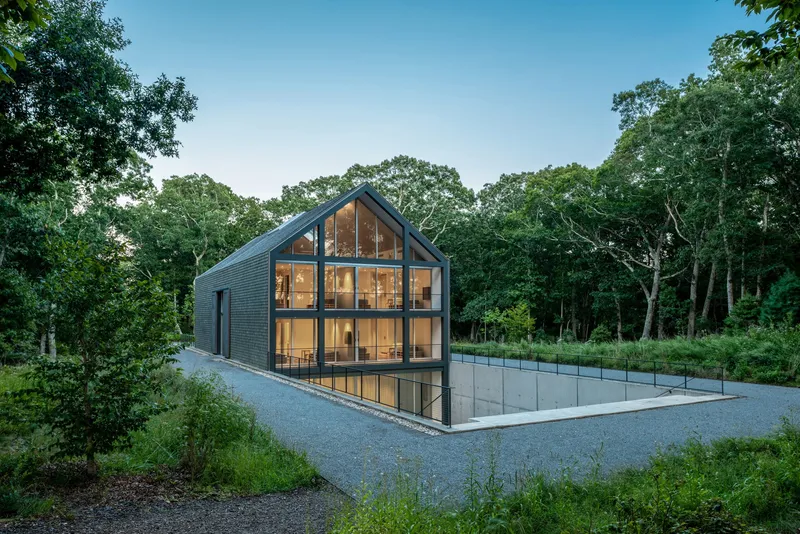 Roger Ferris + Partners Sink a Barn-Shaped Artist Residence into the Earth at the Watermill Center