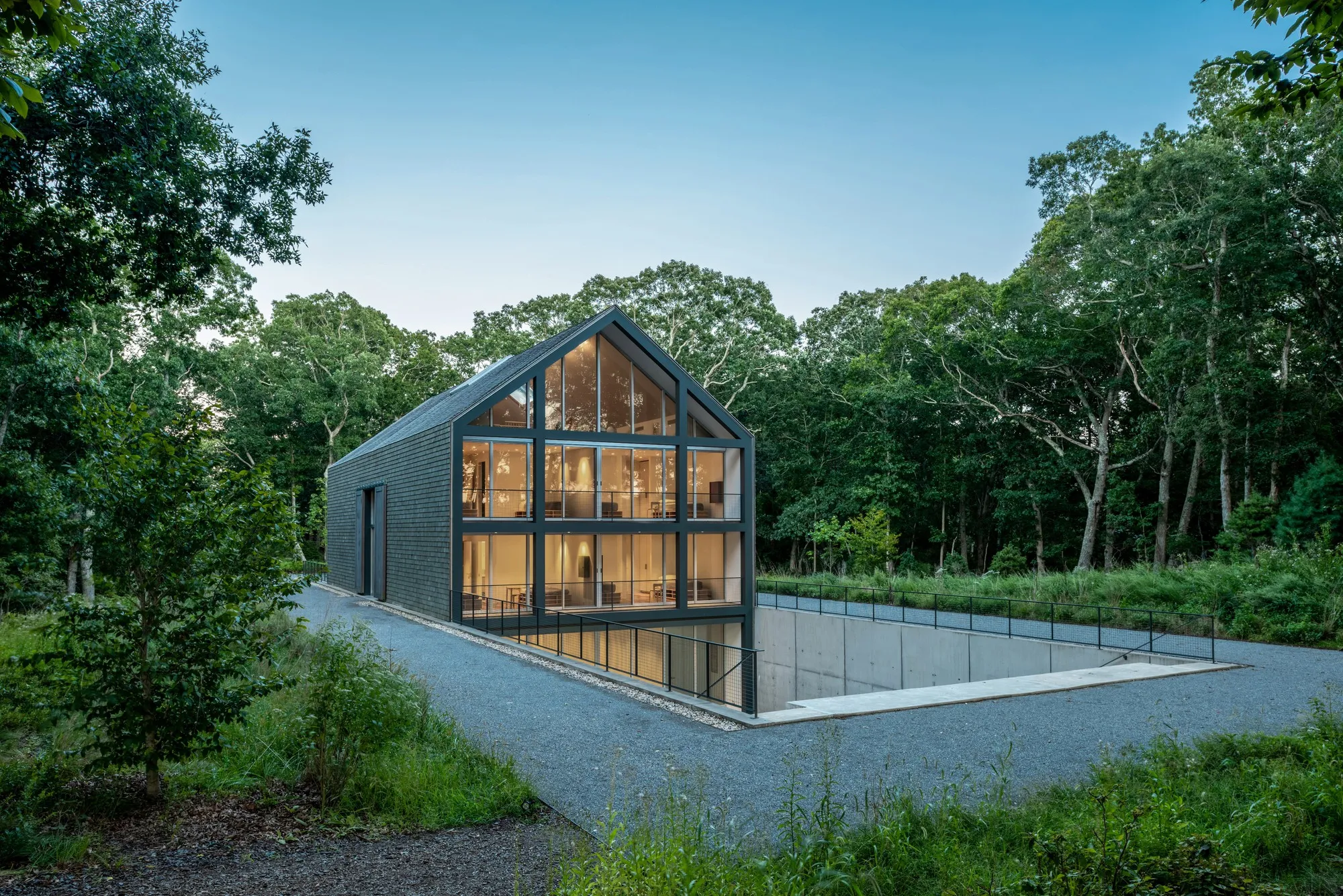 Roger Ferris + Partners Sink a Barn-Shaped Artist Residence into the Earth at the Watermill Center