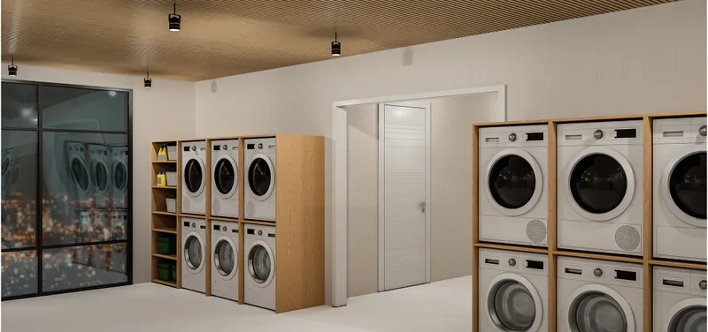 Shared laundry facilities provide residents with essential everyday amenities in a clean and dignified environment.