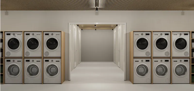 Organized washing and laundry areas reinforce the project’s focus on hygiene, independence, and daily living needs.