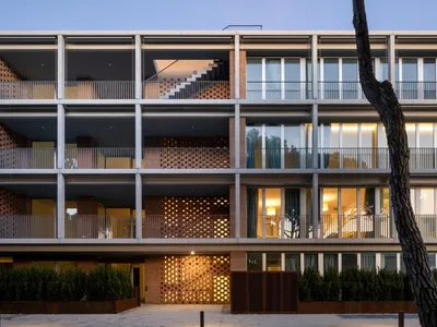 Three Studios Build a Seaside Residence in Jesolo That Mirrors a 1956 Hotel Through Brick and Concrete